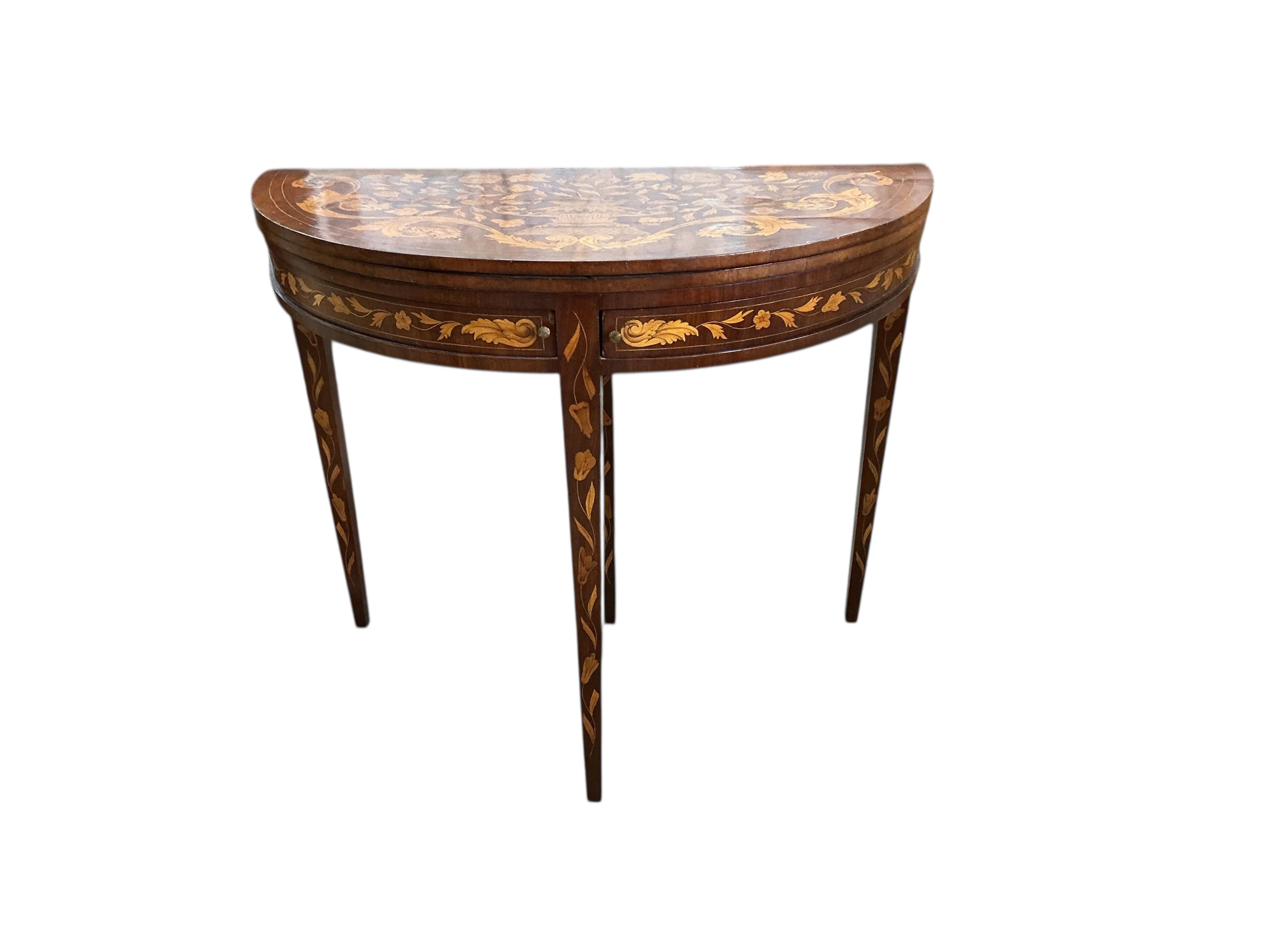 An early 19th century Dutch walnut floral marquetry folding card table, width 88cm, depth 44cm, height 76cm
